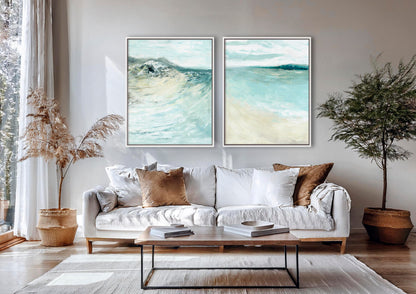 'Coastal Calm' - Beach art paintings set of 2 prints hung together on a white wall, soft blue and teal coastal home decor.