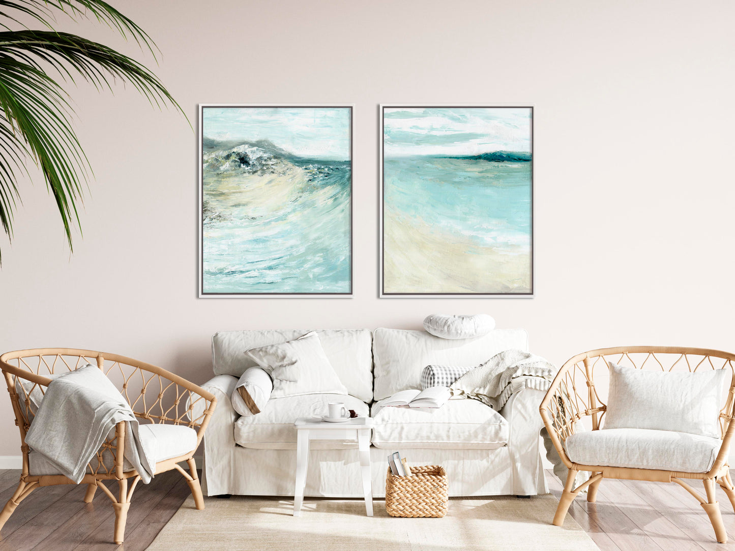 'Coastal Calm' - Set of 2 beach art paintings displayed above a sofa, soft coastal palette in blue and cream.