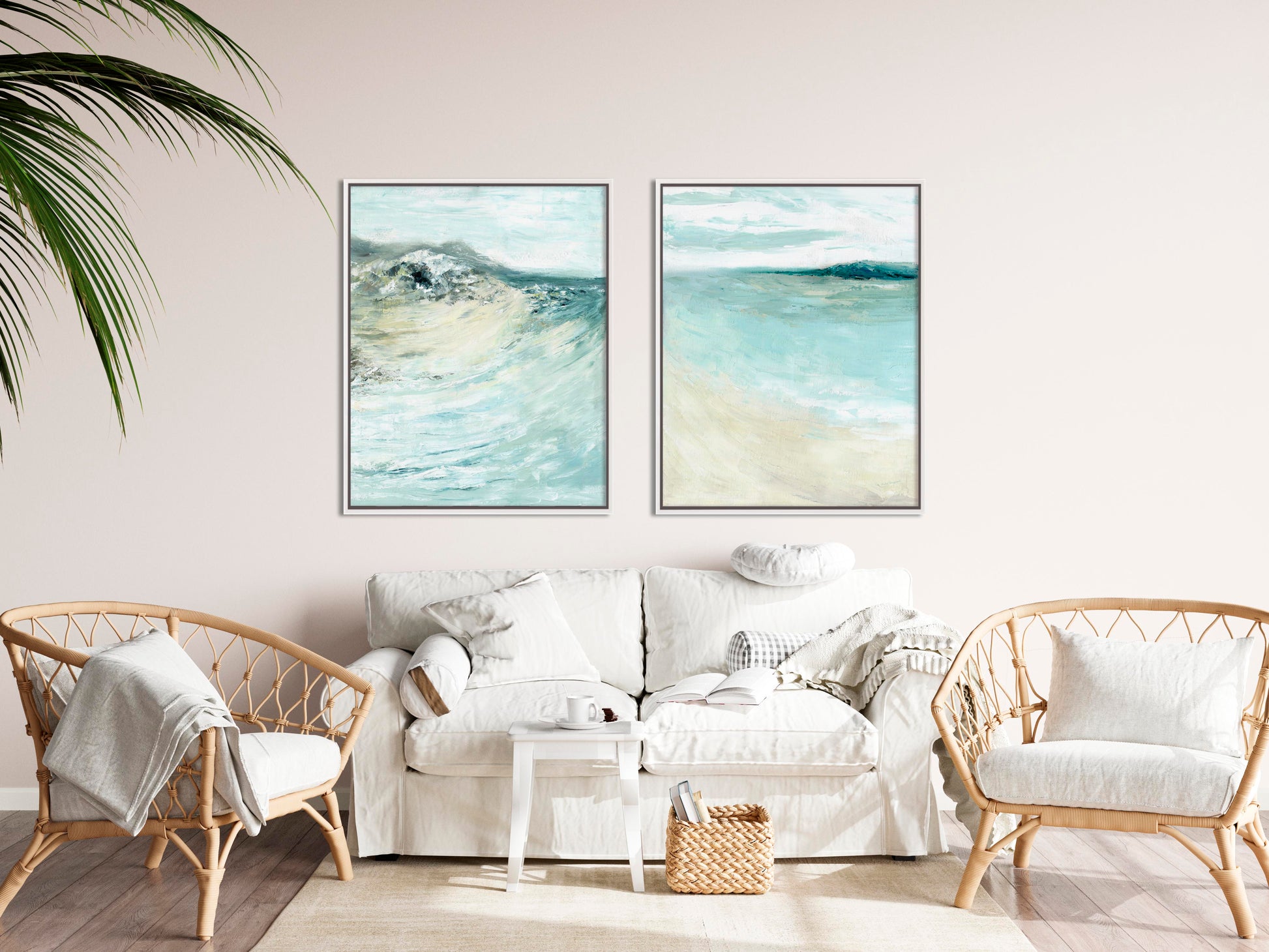 'Coastal Calm' - Set of 2 beach art paintings displayed above a sofa, soft coastal palette in blue and cream.
