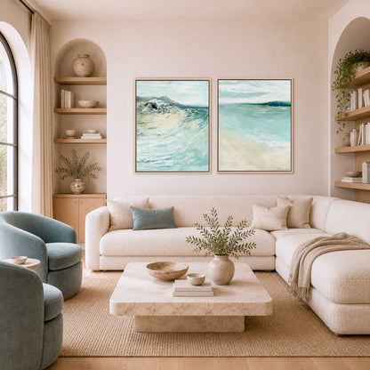 'Coastal Calm' - Beach art paintings set of 2 prints hung together on a white wall, soft blue and teal coastal home decor.