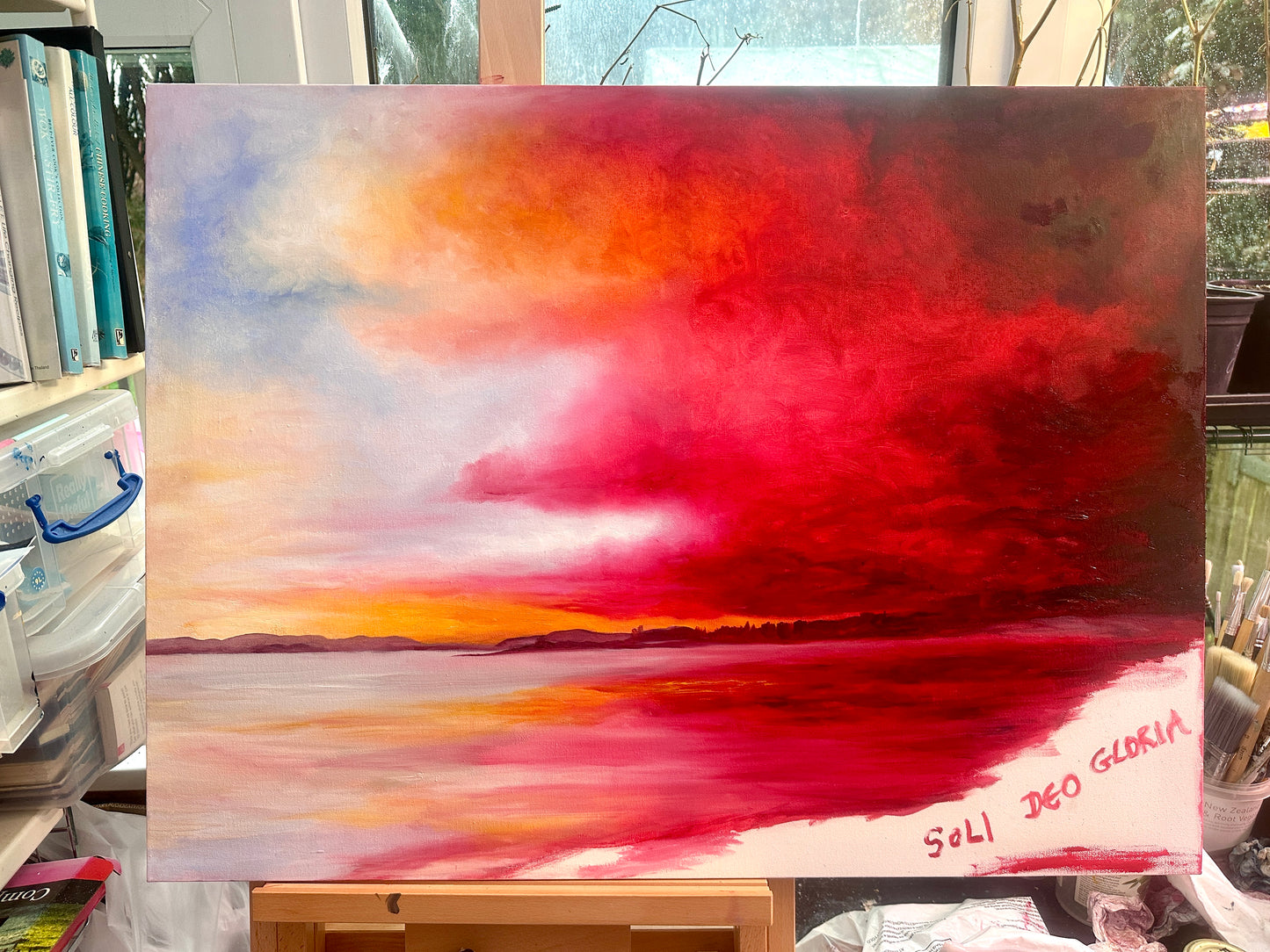 'Breaking Through' - Large original oil on canvas with dramatic reds, burning orange and soft white light breaking through storm clouds above a calm and reflective Poole Harbour coastline, by Kate Shephard Art.